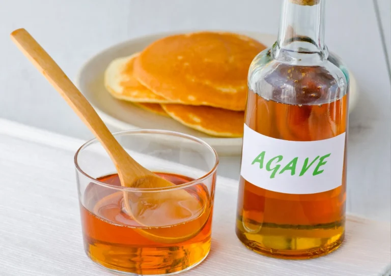 glass of syrup and bottle