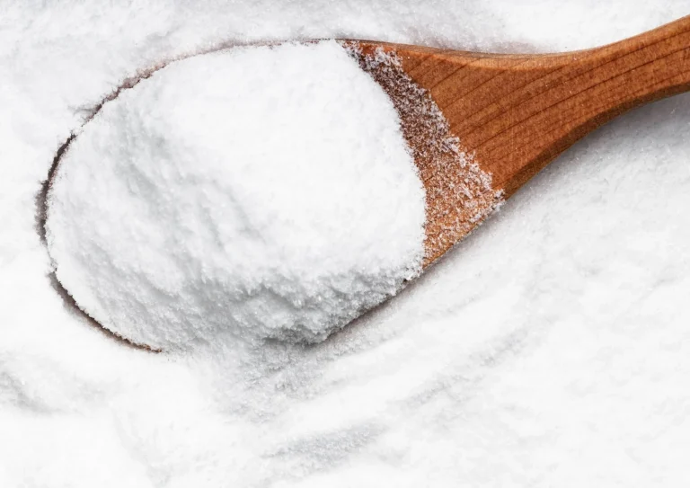powder on the table with wooden spoon