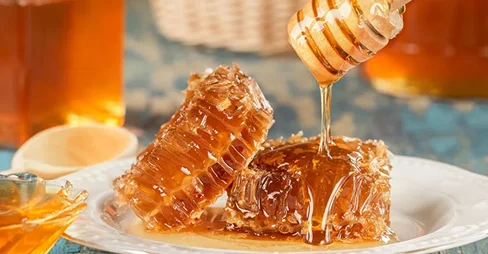 dripping honey in the plate