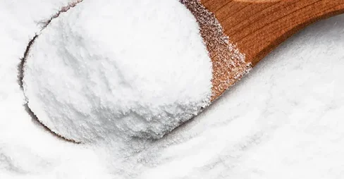 sugar on wooder spoon
