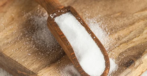 sugar on wooder spoon